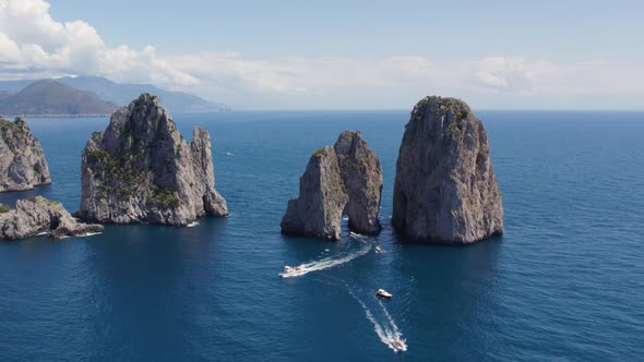 Famous Italy Landmark of Faraglioni Sea Stack Rocks on Island of Capri, Aerial alt