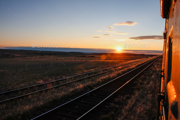 Sunrise seen from the window of a trans-siberian train, in a journey across Mongolian steppe