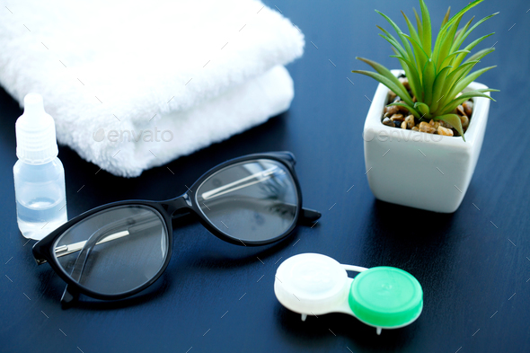 Glasses and objects for cleaning and storing contact lenses, to improve vision