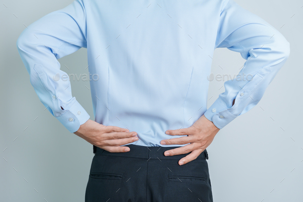 man having back pain. Urinary system and Stones