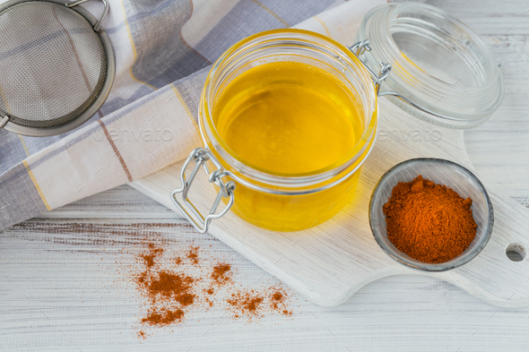 Preparation of Ghee or a clarified butter. Healthy fat diet concept ...