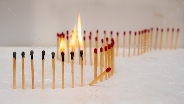 Row of burning matches and all matches