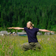 Young man practicing yoga exercises in green nature - PhotoDune Item for Sale
