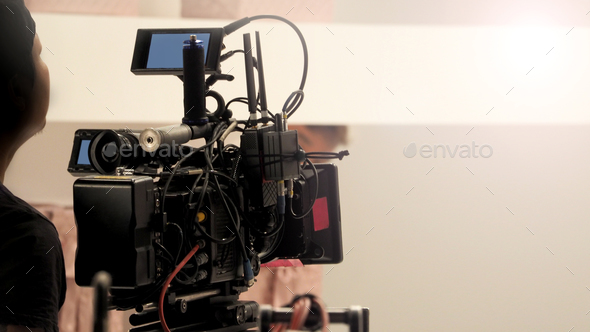 Behind the 4k high defination video camera Stock Photo by gnepphoto
