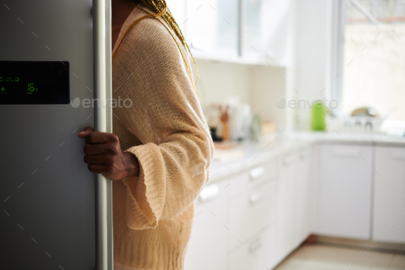 Woman Opening Refrigerator