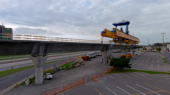 4K camera drone view of the construction site of the REM (Metropolitan Express Network) in Montreal.