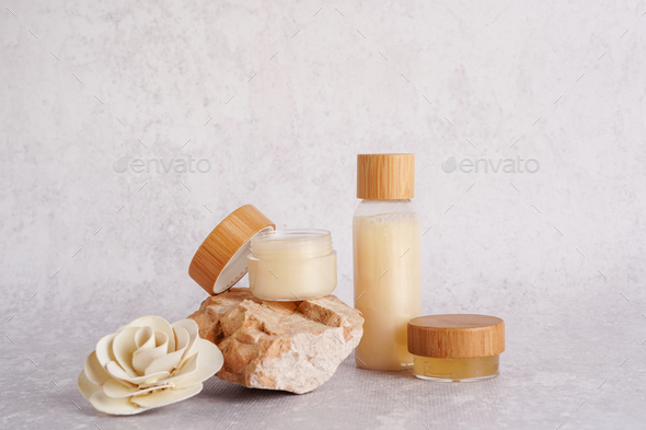 Natural organic eco cosmetics. Beauty SPA, Cosmetic containers with cream and lotion on stone