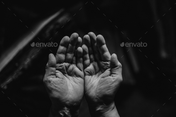 Close up of wrinkled hands, black and white.