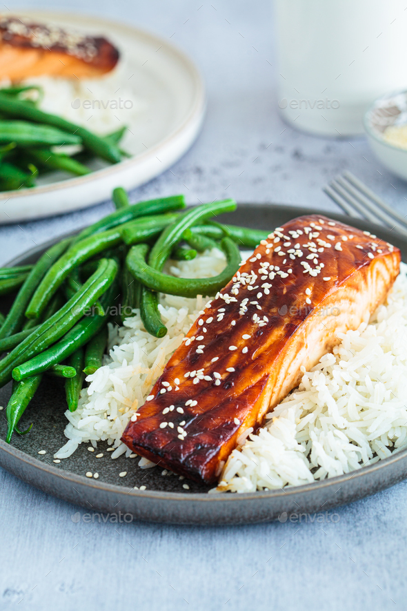Teriyaki salmon with green beans and rice. Asian cuisine recipe. Stock