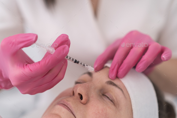 aesthetic beauty injections. smoothing mimic wrinkles using biorevitalization and mesotherapy