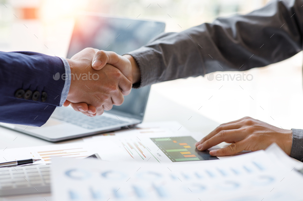 Business handshake for teamwork of business merger and acquisition,successful negotiate,hand shake,t