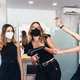 Three playful hairdressers with facial masks - PhotoDune Item for Sale