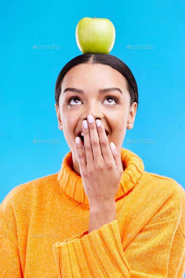 Apple head balance, woman face and surprised with fruit product for
