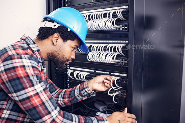 Electrician, engineering and black man with circuit board for inspection, maintenance and repair. C