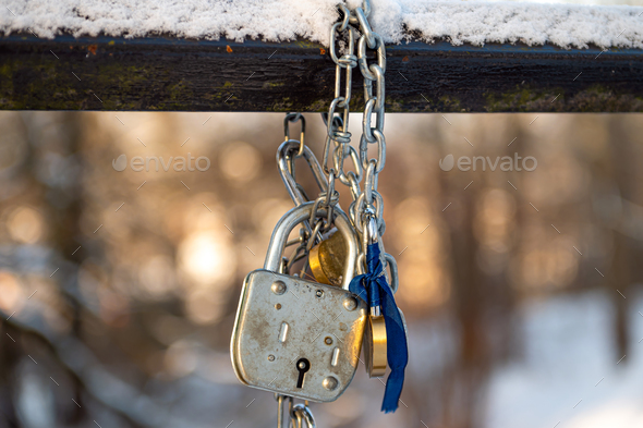 Traditional locks of lovers on the bridge. Symbol of love and fidelity - Stock Photo - Images