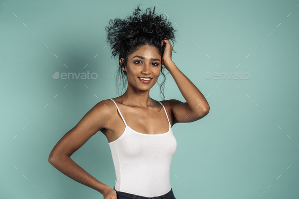 Happy Hispanic Woman in Studio - Stock Photo - Images