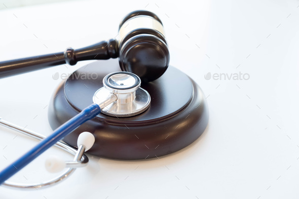 Gavel and stethoscope. medical jurisprudence. legal definition of medical malpractice.