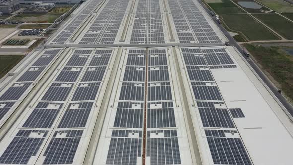 Solar power station on factory rooftop alt