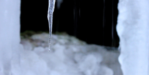 Icicles And Flowing Water