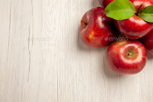 top close view fresh red apples mellow and ripe fruits on white desk fruits color fresh plant red