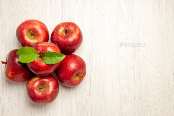 top view fresh red apples mellow and ripe fruits on white desk fruits color fresh plant red tree