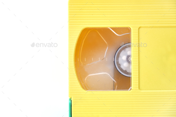 yellow videotape Isolated on white background. Creative concept in retro style, 80s.