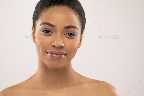 Closeup of beautiful topless young black woman, copy space Stock Photo