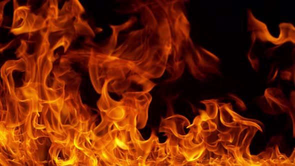 Super Slow Motion Shot of Fire Flames Isolated on Black Background at 1000Fps alt