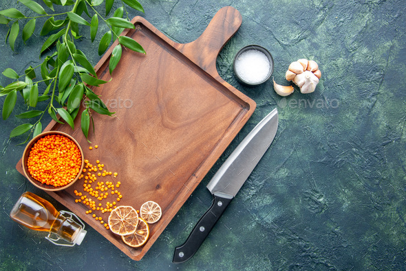 top view brown wooden desk with big knife on dark blue background ancient cuisine food color meat
