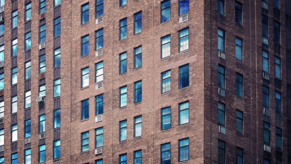 Sky Reflected In Apartment Building Windows alt