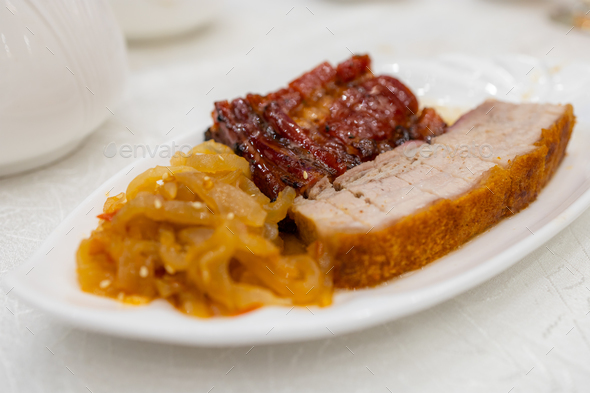Hong Kong style cuisine crispy roasted pork belly and jellyfish