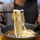 Woman eat Taiwan braised beef noodle soup - PhotoDune Item for Sale