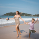 Happy young mother and son runing at beach in summer sunny day - PhotoDune Item for Sale