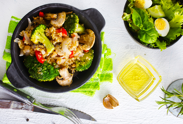 porridge with mushroom and boiled broccoli in bowl - Stock Photo - Images