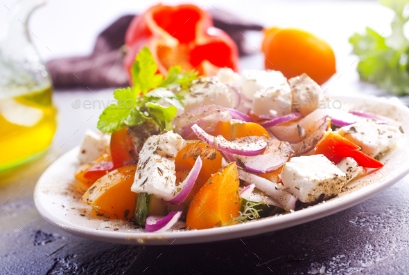 Greek salad of fresh vegetables and cheese - Stock Photo - Images
