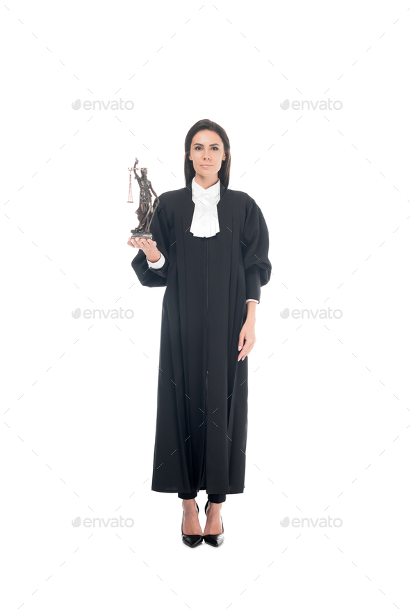 Full length view of judge in judicial robe holding themis figurine ...