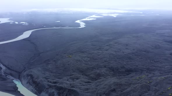 Flying Above a Glacial River System of Iceland alt