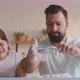 Father and Daughter Preparing Cakes Together - VideoHive Item for Sale