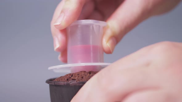 Process of Cutting Out the Core of the Cupcake for Subsequent Filling alt