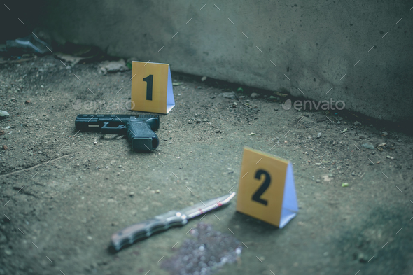 Evidence is marked with evidence markers on the floor