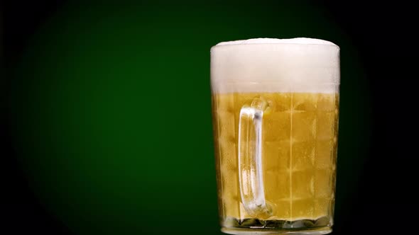 Beer Mug On Green Background