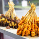 Bunch of raw chicken and beef satay sticks on street stall before being barbecue - PhotoDune Item for Sale