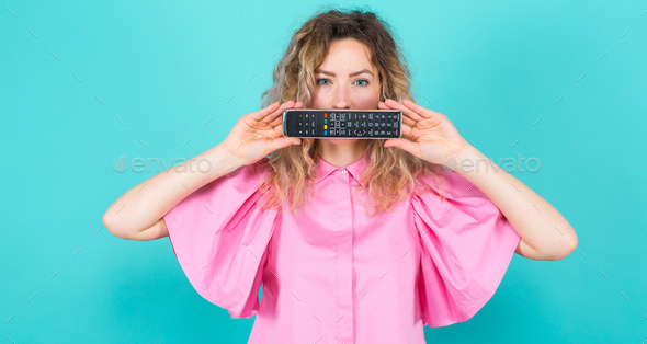 Attractive woman with remote control