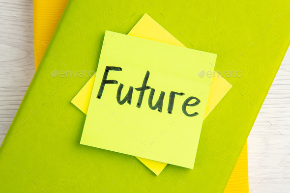 top view future note on sticker with copybooks on a white background work color job motivation