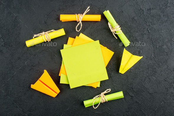 top view yellow sticky notes scroll sticky notes tied with rope on ...