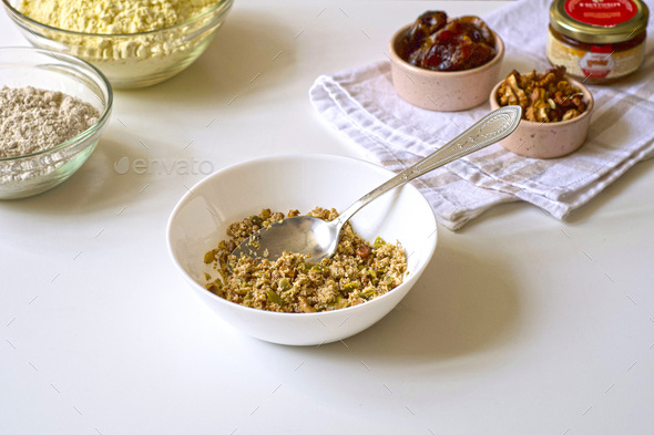 Step-by-step preparation of vegan gluten-free corn oat cookies with raisins, honey, coconut oil.