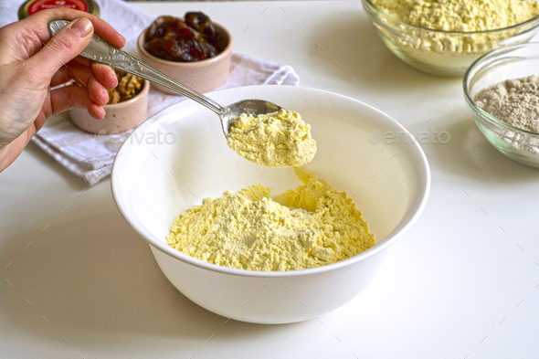 Step-by-step preparation of vegan gluten-free corn oat cookies with nuts, berries, raisins, honey