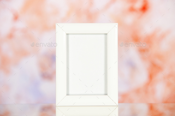 front view white picture frame on a light red background present portrait color family photo shoot
