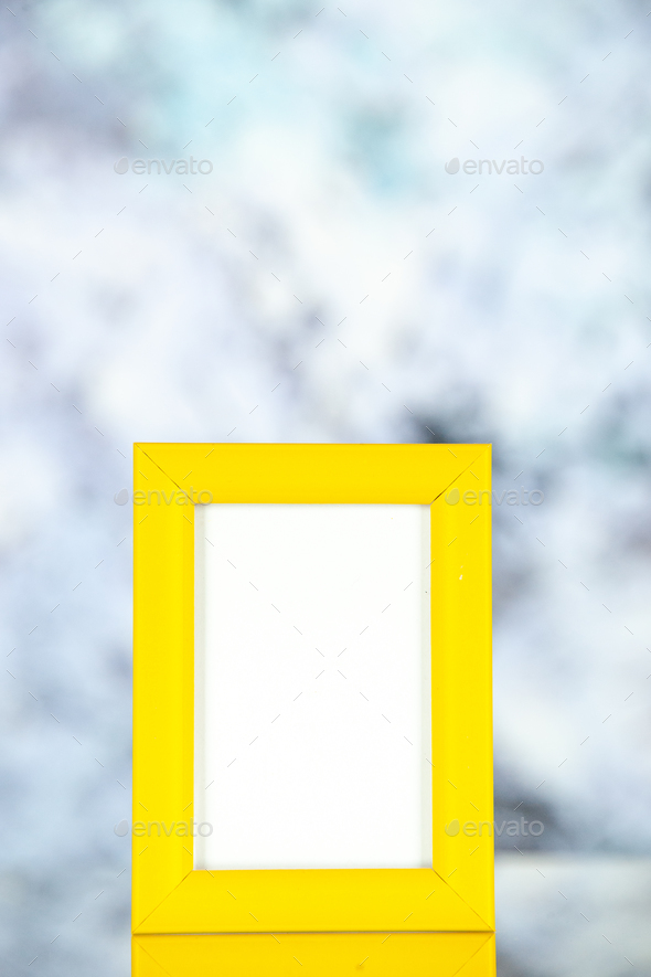 front view yellow picture frame on a light background shoot picture gift photo present color