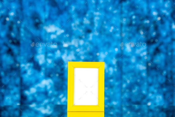 front view yellow picture frame on blue background portrait photo color present family gift picture